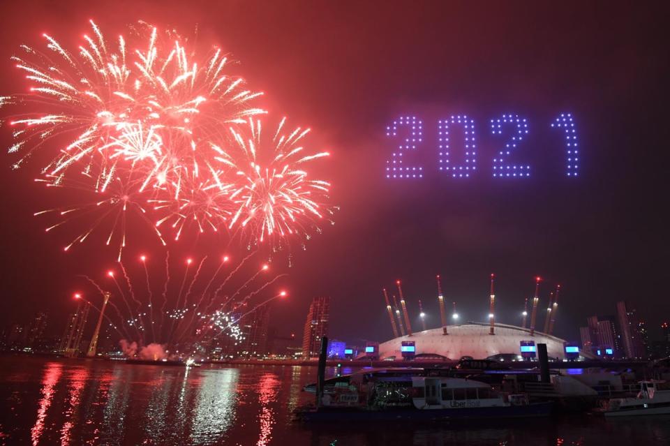 Fireworks and drones illuminate the night sky over London (PA)