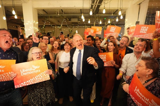 Liberal Democrat leader Sir Ed Davey celebrates at the London Art Bar 