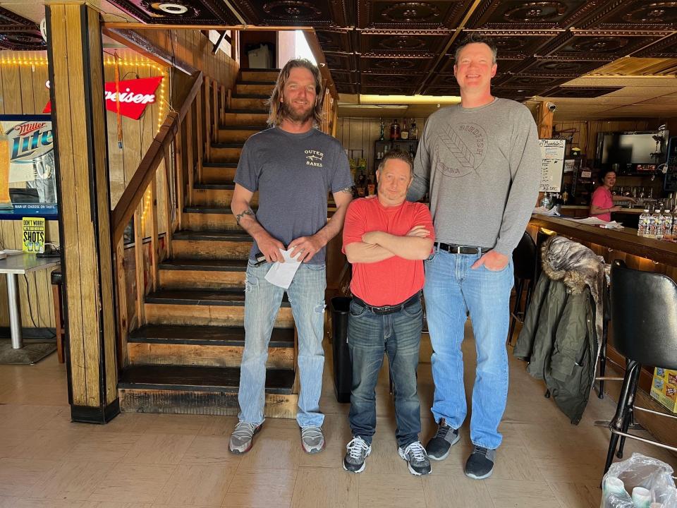 "Gemini" co-star Scott Schwartz, center, on set at The Corner Pocket Bar in Leetonia. With him are the two tallest men on set, Corner Pocket's owner Jerrad Rydarowicz, left, who has a speaking role in the film, and actor John Tomsich, who plays the film's villain.