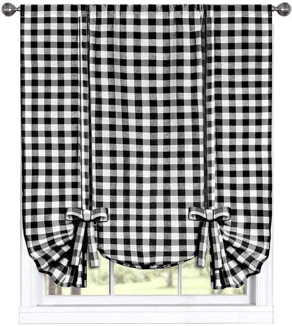 When you think of farmhouse style, gingham is probably one of the first things you imagine. These top-rated gingham curtains come ready to hang and are machine washable. <a href="https://amzn.to/3dIgpVl" target="_blank" rel="noopener noreferrer">Find it for $20 at Amazon</a>.