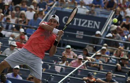 Guido Pella of Argentina serves to Marin Cilic of Croatia during their match at the U.S. Open Championships tennis tournament in New York, August 31, 2015. REUTERS/Mike Segar