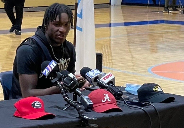 Luther Burden moments before committing to play football at Missouri.