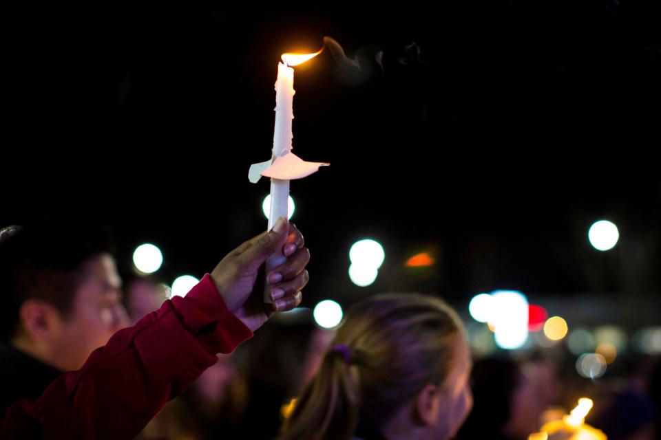 A candlelight vigil in honor of teacher Abby Zwerner in Newport News, Va., on Jan. 9,  Zwerner, 25, was struck by a bullet through her hand and chest. Her attorney said she faces a lifetime of physical and psychological recovery.