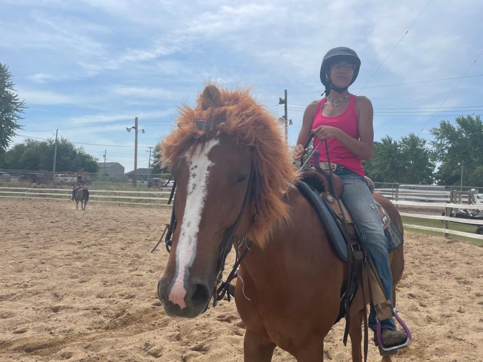 A 4-H member prepares for a musical dance activity in the horse and pony arena at the St. Joseph County Fairgrounds on Monday, July 4, 2022.