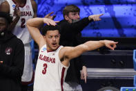 Alabama forward Alex Reese (3) reacts to a play against UCLA in the first half of a Sweet 16 game in the NCAA men's college basketball tournament at Hinkle Fieldhouse in Indianapolis, Sunday, March 28, 2021. (AP Photo/Michael Conroy)