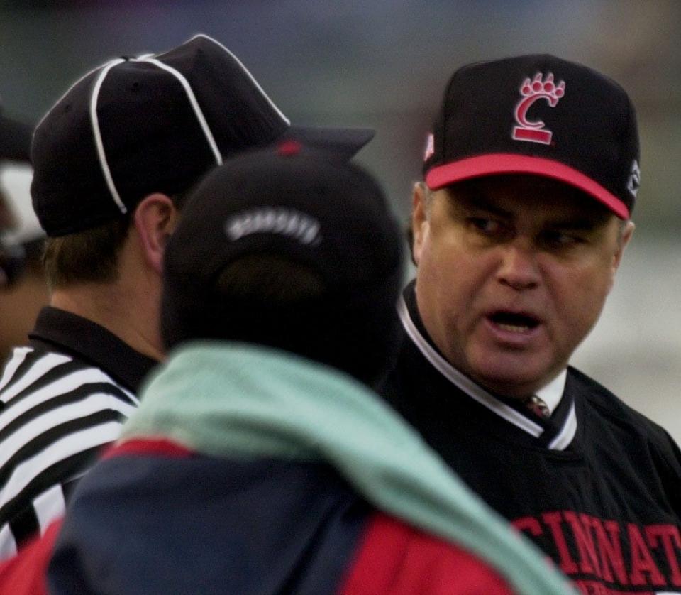 UC head coach Rick Minter says a few word to an official in the fourth quarter after a no call on a play that looked like pass interference at Nippert Stadium in Cincinnati on Oct. 27, 2001.