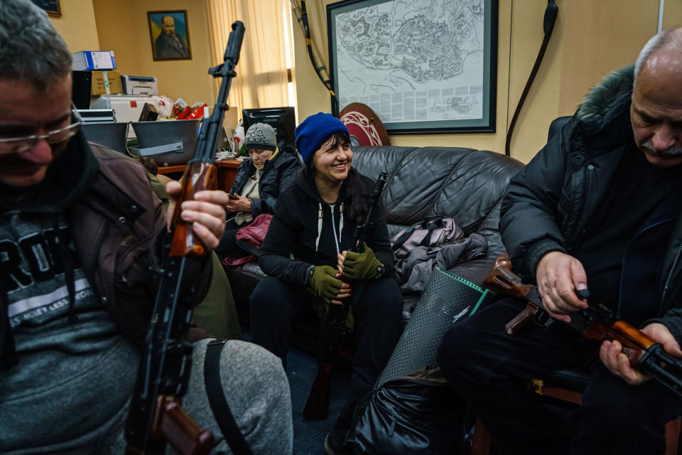 Volunteers for the Territorial Defense Forces gather in an outpost to collect weapons, train, and get their assignments in Kyiv on Feb. 26.<span class="copyright">Marcus Yam—Los Angeles Times/Getty Images</span>
