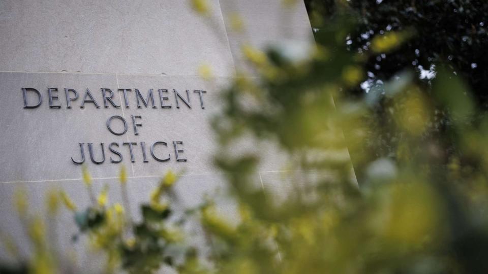 Signage outside the Department of Justice headquarters in Washington, D.C., Feb. 17, 2023. (Bloomberg via Getty Images)