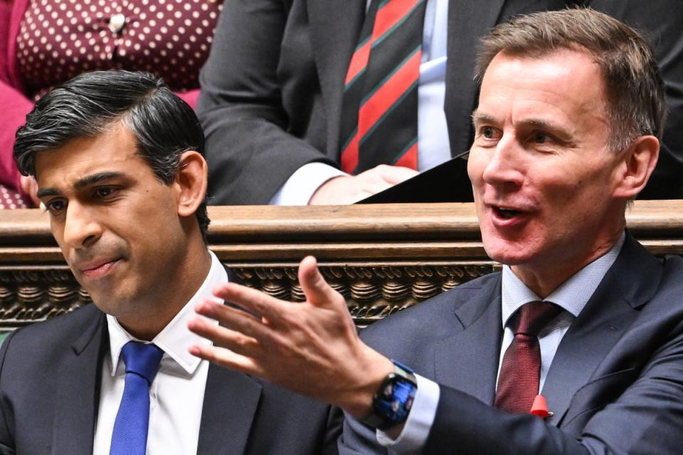 Rishi Sunak and Jeremy Hunt (UK PARLIAMENT/AFP via Getty Imag)