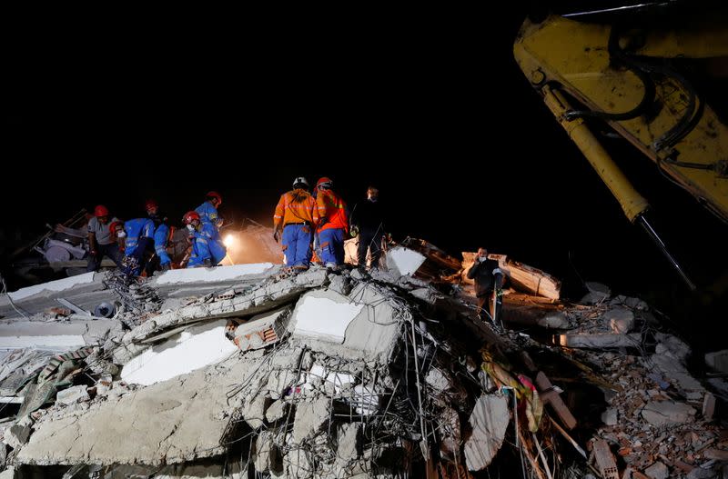 Rescue operations take place on a site after an earthquake struck the Aegean Sea, in the coastal province of Izmir