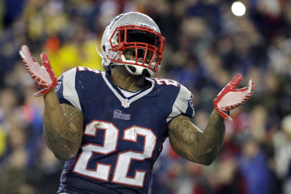 New England Patriots running back Stevan Ridley celebrates his touchdown during the second half of an AFC divisional NFL playoff football game against the Indianapolis Colts in Foxborough, Mass., Saturday, Jan. 11, 2014. (AP Photo/Matt Slocum)