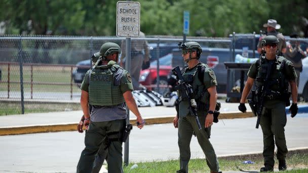 PHOTO: Law enforcement personnel stand outside Robb Elementary School following a shooting, May 24, 2022, in Uvalde, Texas. (Dario Lopez-Mills/AP, FILE)