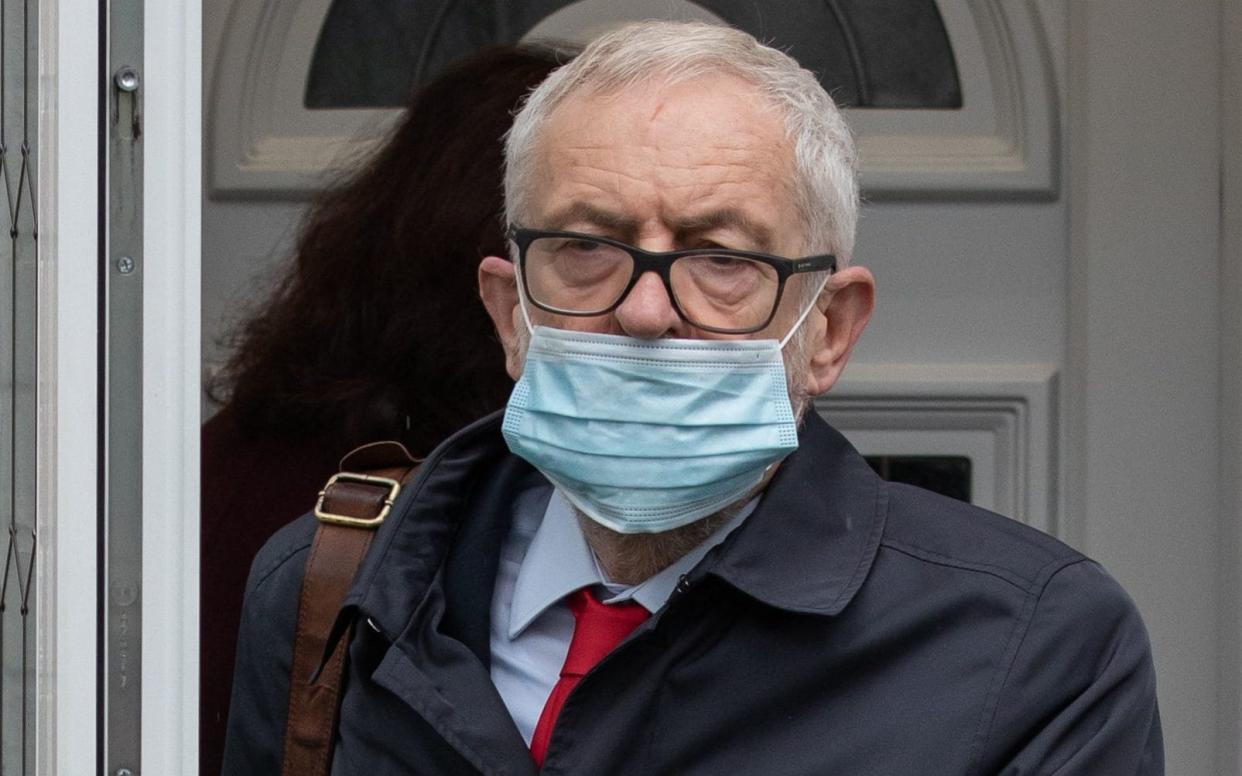 Former Labour leader Jeremy Corbyn leaves his house in North London ahead of the release of an anti-Semitism report by the Equality and Human Rights Commission - PA