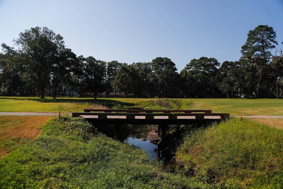 A cart path bridge crosses the drainage canal at the LaVida Golf Club.
