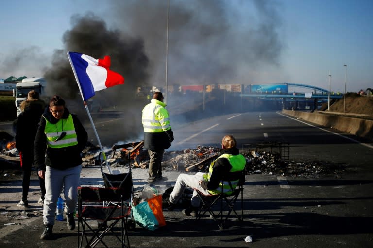 Dozens of barricades were still being manned on motorways and roundabouts across France as 'yellow vest' protesters pursued their movement