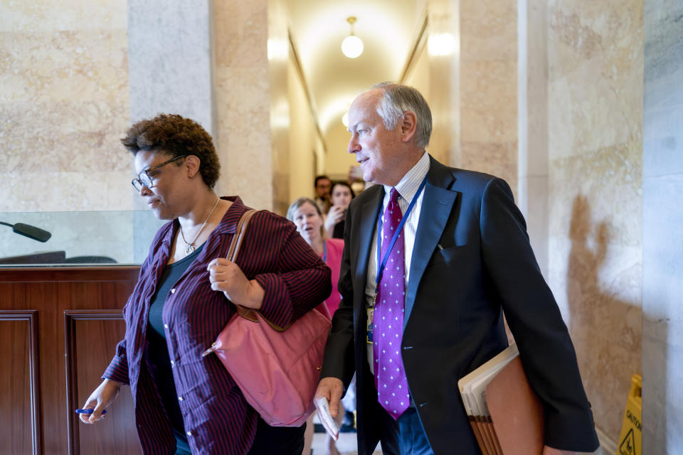 Shalanda Young, director of the Office of Management and Budget, left, and Steve Ricchetti, counselor to the president, the top negotiators for President Joe Biden on the debt limit crisis, leave after talks with House Speaker Kevin McCarthy's emissaries came to an halt, at the Capitol in Washington, Friday, May 19, 2023. (AP Photo/J. Scott Applewhite)