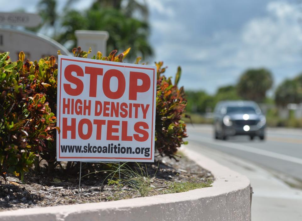 This file photo shows signs that popped up across Siesta Key during the fight to stop proposed hotels there in 2021. Despite legal setbacks, proposals for intensive hotel development on Siesta Key will once again come before the County Commission more than two years after two projects were approved.