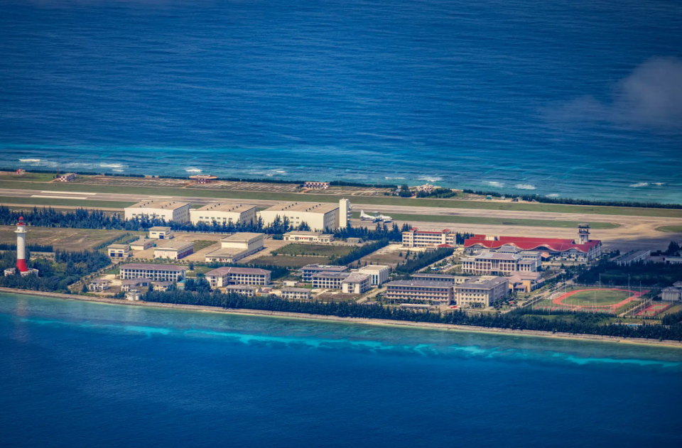 A Chinese KJ-500 airborne early warning and control (AEW&C) aircraft on the airfield constructed on the island built out of Fiery Cross Reef in the South China Sea. <em>Ezra Acayan/Getty Images</em><br>