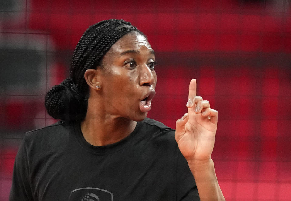 United States' Foluke Akinradewo Gunderson gestures during a women's volleyball training session at the 2020 Summer Olympics, Thursday, July 22, 2021, in Tokyo, Japan. A third trip to the Olympics was far from a sure thing for Gunderson when she gave birth to her first son in November 2019. But Gunderson had set a goal of being both a mother and professional athlete and took advantage of the delayed Olympics to make it back again this year in search of that elusive gold medal. (AP Photo/Frank Augstein)