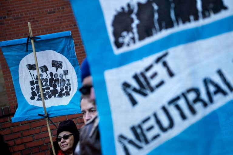 Activists outside the Federal Communications Commission ahead of a vote on "net neutrality" regulations