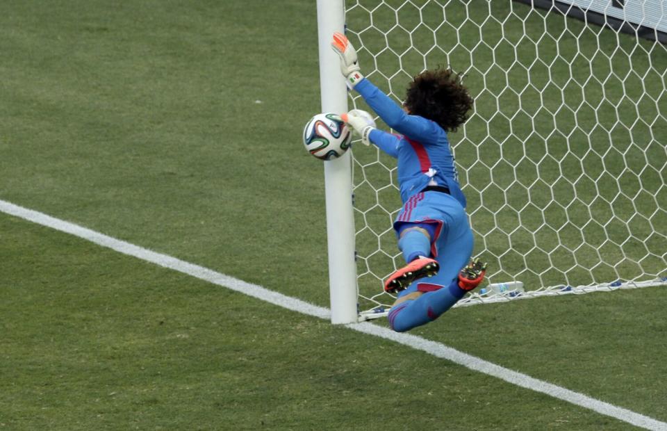 Mexico's goalkeeper Guillermo Ochoa makes a save durin