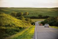 <p><strong>The Drive: </strong><a href="https://www.travelks.com/ksbyways/flint-hills/" rel="nofollow noopener" target="_blank" data-ylk="slk:Flint Hills National Scenic Byway;elm:context_link;itc:0;sec:content-canvas" class="link ">Flint Hills National Scenic Byway</a></p><p><strong>The Scene: </strong>Enjoy nature by rolling your windows down and taking in incredible panoramic vistas of rolling hills and pretty prairie flowers on this scenic byway. (Psst: It's best to drive through this 47.2-mile route in the spring!)</p><p><strong>The Pit-Stop: </strong>Relax at <a href="https://www.travelks.com/listing/schrumpf-hill-scenic-overlook/12131/" rel="nofollow noopener" target="_blank" data-ylk="slk:Schrumpf Hill Scenic Overlook;elm:context_link;itc:0;sec:content-canvas" class="link ">Schrumpf Hill Scenic Overlook</a> right before dusk. After all, the Flint Hills are famous for being one of the <a href="http://green-landscape.com/worlds-top-7-places-to-watch-sunsets/" rel="nofollow noopener" target="_blank" data-ylk="slk:best places in the world to see the sun set;elm:context_link;itc:0;sec:content-canvas" class="link ">best places in the world to see the sun set</a>.  </p>