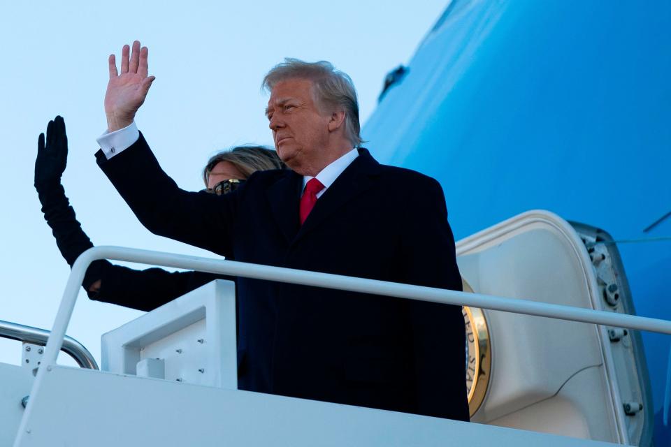 Former President Donald Trump and Former First Lady Melania Trump step into Air Force One at Joint Base Andrews in Maryland on Jan. 20, 2021.