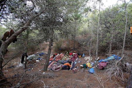 African migrants sleep in their hiding place in the Moroccan mountains near the city of Tangier, Morocco September 6, 2018. REUTERS/Youssef Boudlal