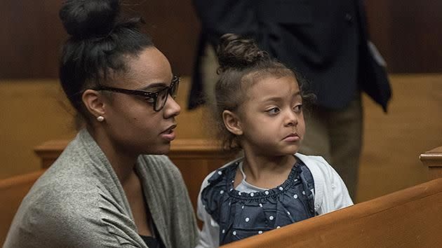 Hernandez's fiancee and daughter support him in court. Pic: Getty