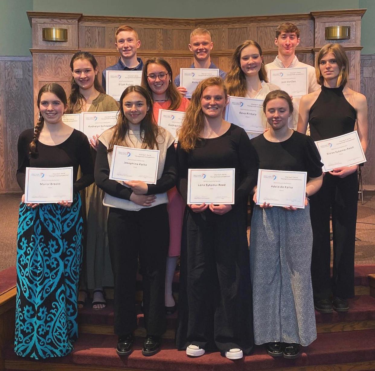 Young Artist Competition participants (back row, from left) are Elijah Pulver, Ricky Bristol, Jack Van Zee, (middle row) Katie Schepperley, Catherine Hayes, Eeva Rintala, Blaise Sytsma-Reed, (front row) Marial Brooks, Josie Kolka, Lena Sytsma-Reed and Addie Kolka.
