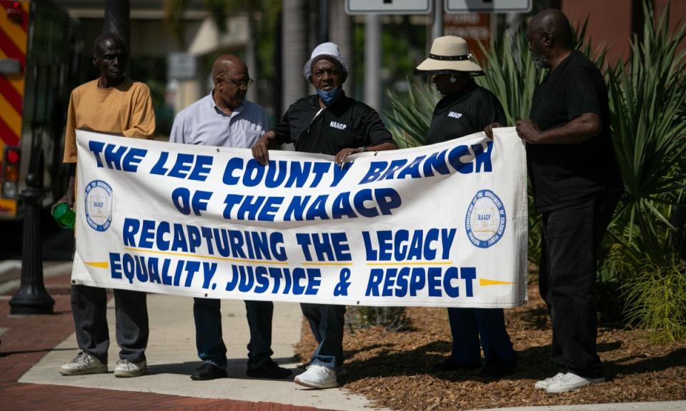 Members of the Lee County NAACP held a rally in front of the office of the state attorney in downtown Fort Myers Friday afternoon, March 15, 2024 to protest the handling of the Fort Myers Police Department fatal shooting of Christopher Jordan on December 1, 2023.