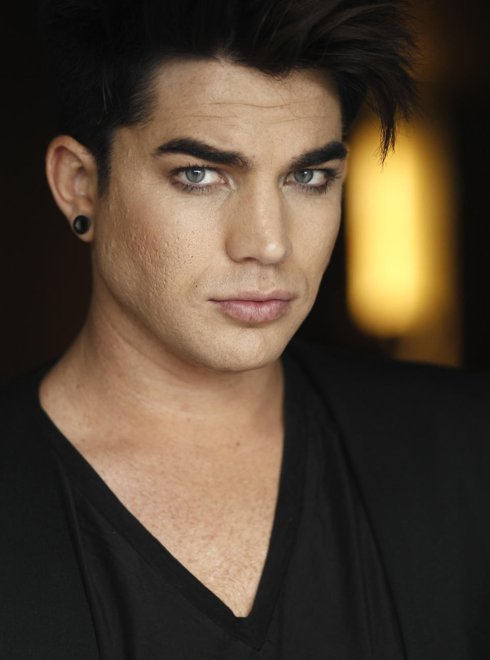 In this Jan. 23, 2012 photo, musician Adam Lambert poses for a portrait in Beverly Hills, Calif. Lambert's new album "Trespassing" will be released May 15. (AP Photo/Matt Sayles)