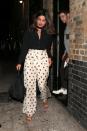 The actress was spotted in fashion-forward trousers as she left dinner with boyfriend Nick Jonas.