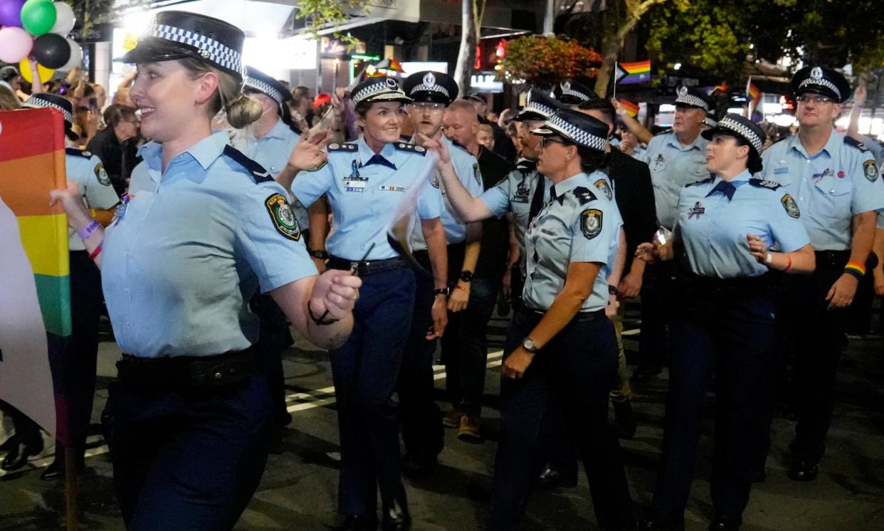<span>NSW police officers including the commissioner, Karen Webb, at the 2023 Sydney Mardi Gras. Officers will march in plainclothes this year. </span><span>Photograph: Mark Baker/AP</span>