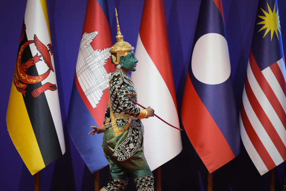 A Cambodian traditional dancer performs during the opening ceremony of the 40th and 41st ASEAN Summits (Association of Southeast Asian Nations) in Phnom Penh, Cambodia, Friday, Nov. 11, 2022. The ASEAN summit kicks off a series of three top-level meetings in Asia, with the Group of 20 summit in Bali to follow and then the Asia Pacific Economic Cooperation forum in Bangkok. (AP Photo/Vincent Thian)
