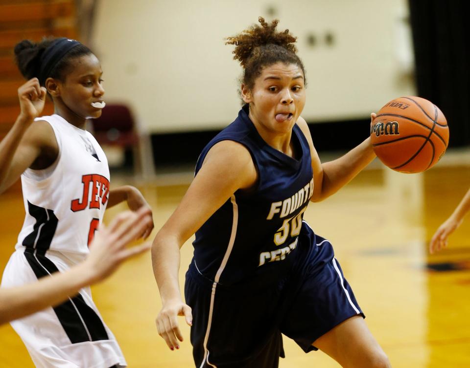 Macee Williams of Fountain Central gets past Kyrstin Green of Lafayette Jeff Wednesday, January 11, 2017, in Lafayette. Jeff rallied to beat Fountain Central 58-57 for its 11th win in a row.