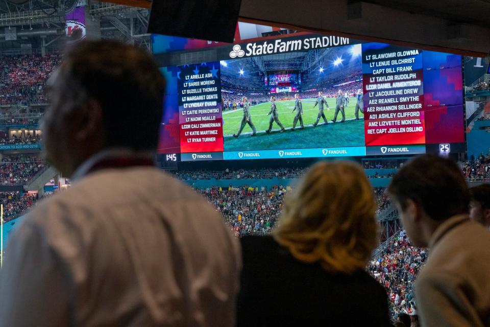 First Lady Jill Biden views a recognition of service members who participated in the pre-game all-women flyover of the State Farm Stadium, Sunday February 12, 2023, at the Super Bowl in Phoenix, AZ.
