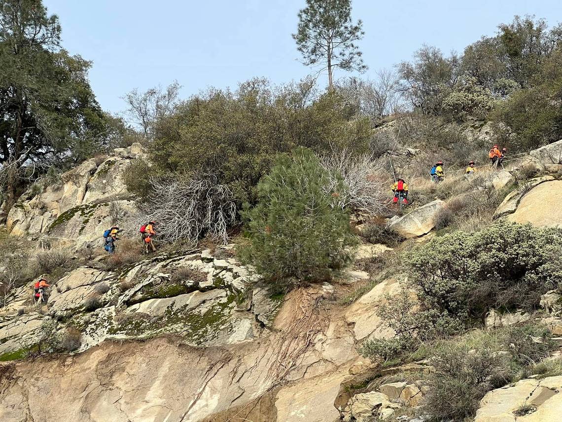 A Caltrans scaling team assesses the side of the mountain where a recent rockslide has led to the closure of Highway 168 in eastern Fresno County.
