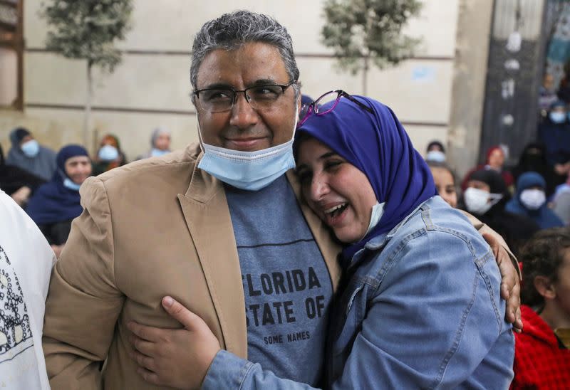 Journalist Mahmoud Hussein released by Egyptian authorities after four years in detention accused of publishing false news, in Abou Al Nomros, in Giza