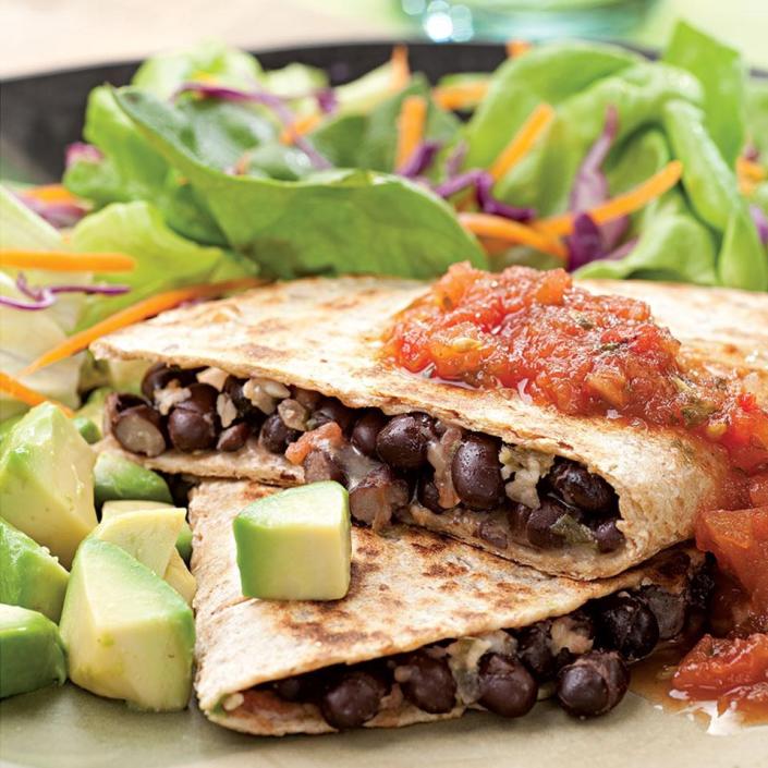 <p>In a hurry? These satisfying quesadillas take just 15 minutes to make. We like them with black beans, but pinto beans work well too. If you like a little heat, be sure to use pepper Jack cheese in the filling. Serve with: A little sour cream and a mixed green salad.</p>