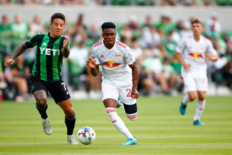 Austin FC midfielder Sebastián Driussi, left, chases New York Red Bulls forward Serge Ngoma during the teams' game Sunday at Q2 Stadium. Driussi had two goals in a 4-3 loss.