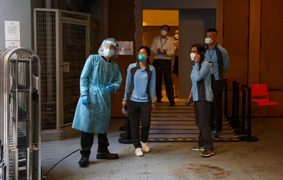 Health workers at the hotel on Friday. Photo: Yik Yeung-man