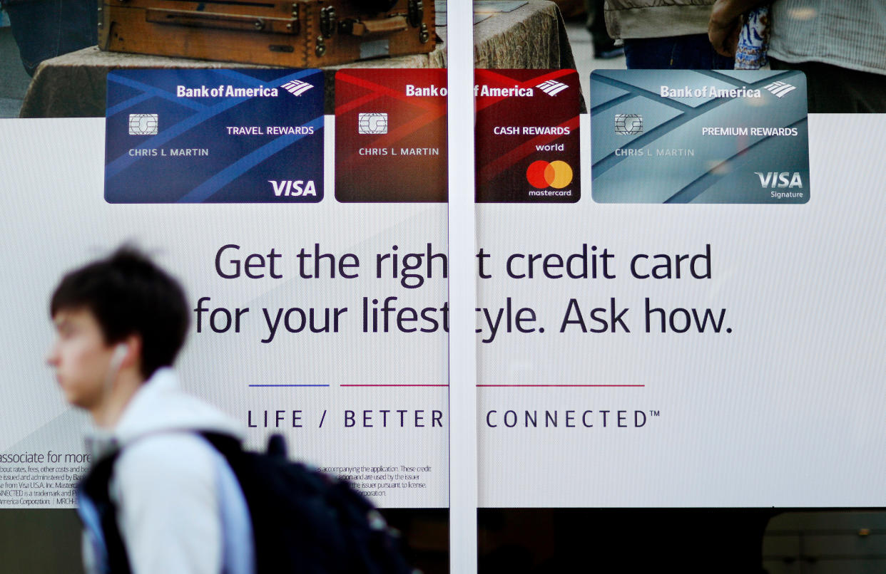 A credit card advertisement decorates a bank's window in Atlanta. (David Goldman, AP Photo)