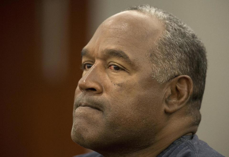 O.J. Simpson testifies during an evidentiary hearing in Clark County District Court, Wednesday, May 15, 2013 in Las Vegas. Simpson, who is currently serving a nine to 33-year sentence in state prison as a result of his October 2008 conviction for armed robbery and kidnapping charges, is using a writ of habeas corpus, to seek a new trial, claiming he had such bad representation that his conviction should be reversed. (AP Photo/Julie Jacobson, Pool)