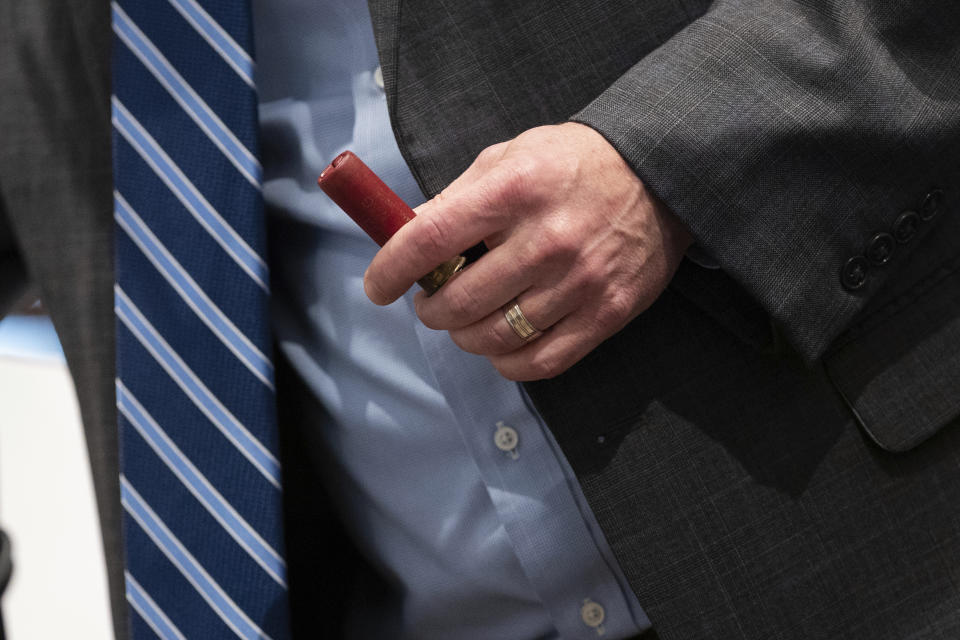 Prosecutor Creighton Waters holds a shotgun shell during Alex Murdaugh's trial for murder at the Colleton County Courthouse on Tuesday, Jan. 31, 2023 in Walterboro, S.C. Murdaugh, 54, is standing trial on two counts of murder in the shootings of his 52-year-old wife and 22-year-old son. Murdaugh faces 30 years to life in prison if convicted. (Joshua Boucher/The State via AP, Pool)