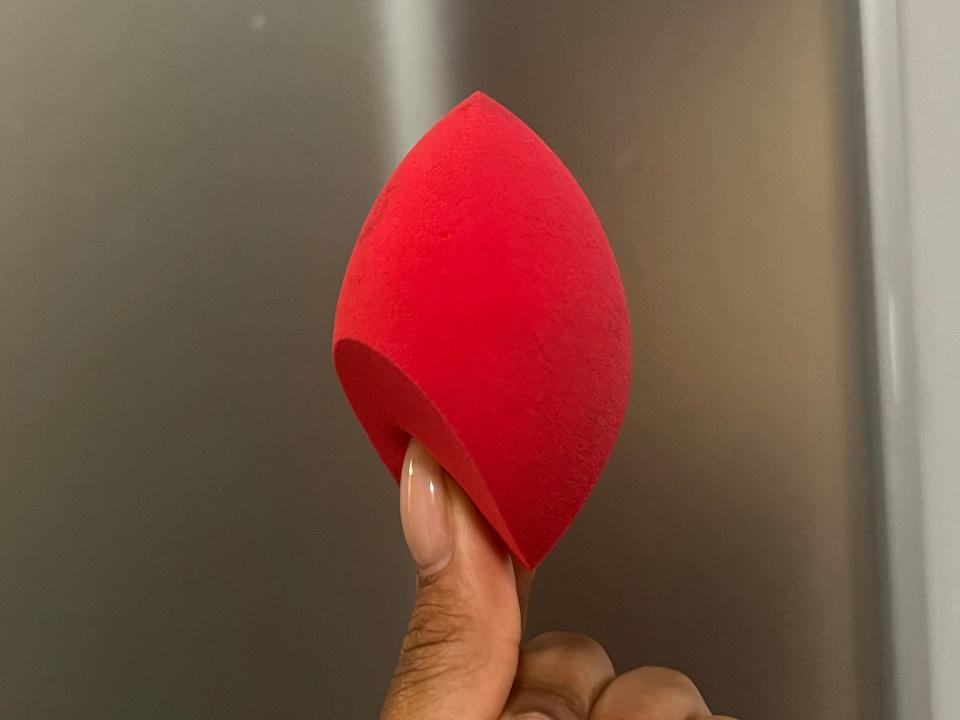 The writer holds a Morphe beauty sponge