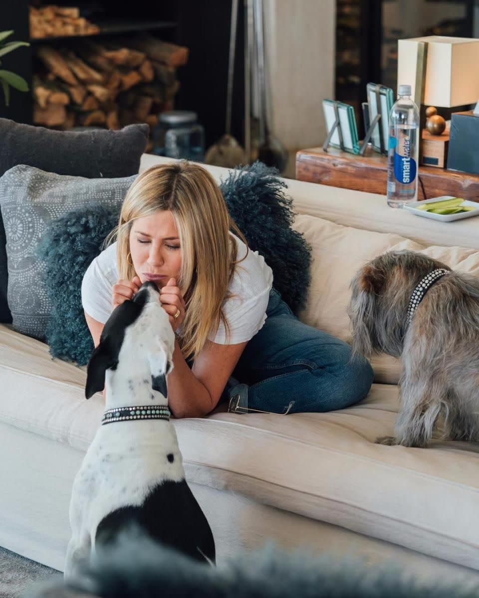 Jennifer Aniston poses with her two dogs. Source: Instagram