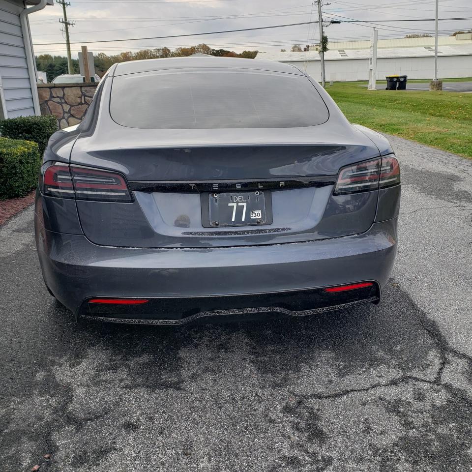 Only one Tesla is currently known to have a Delaware black-and-white license plate in single or double digits: No. 77.