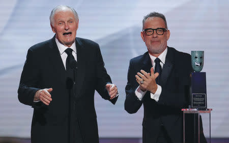 25th Screen Actors Guild Awards - Show - Los Angeles, California, U.S., January 27, 2019 - Actor Tom Hanks presents the Lifetime Achievement Award to honoree Alan Alda. REUTERS/Mike Blake