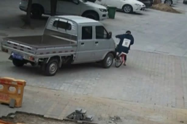 The young cyclist was dragged along after colliding with the truck, leaving her trapped underneath its wheels.